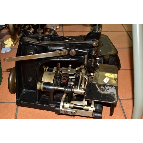 802 - THREE CAST IRON SEWING MACHINES, late nineteenth/early twentieth century, comprising an American Eat... 