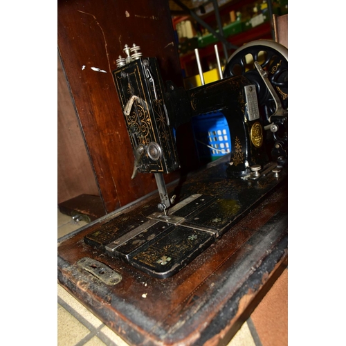 804 - FOUR ANTIQUE SEWING MACHINES, three with cases, late nineteenth/early twentieth century, comprising ... 