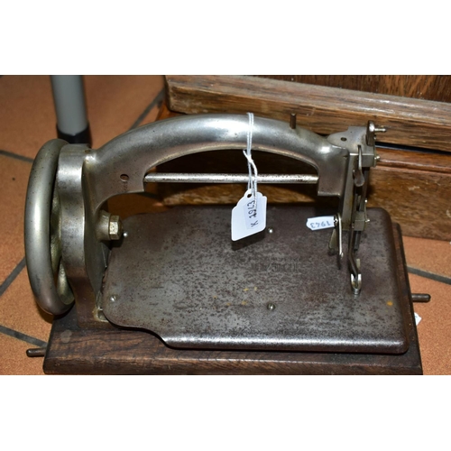 804 - FOUR ANTIQUE SEWING MACHINES, three with cases, late nineteenth/early twentieth century, comprising ... 