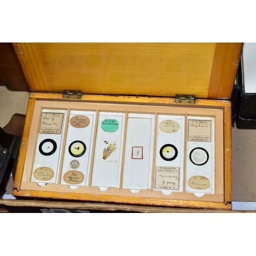 809 - A BOX OF MICROSCOPE PARTS AND SLIDES, to include an unmarked brass microscope in a wooden case (in p... 