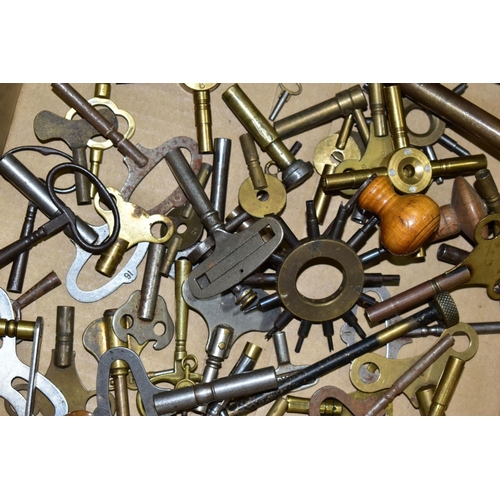 810 - A BOX OF CLOCK AND WATCH KEYS, to include various makers, shapes and sizes, some brass keys, crank h... 