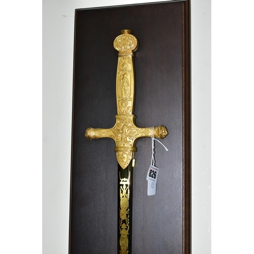 826 - A NAPOLEON I REPLICA SWORD, together with a wooden wall hanging mount bearing an engraved plaque ''E... 