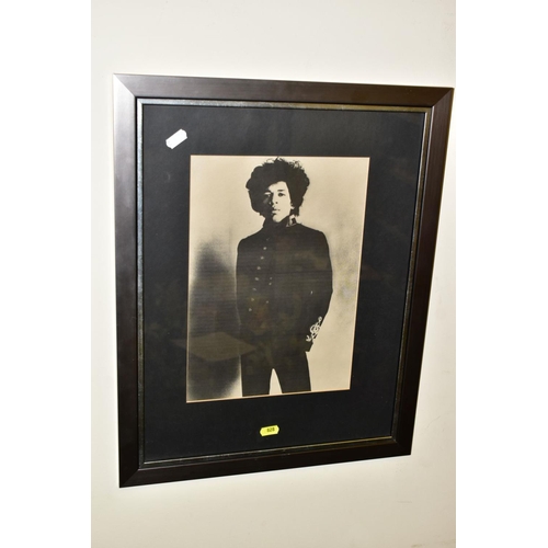 828 - JIMI HENDRIX, three Jimi Hendrix images, a Val Wilmer photo-lithograph limited edition 68/500 of Jim... 