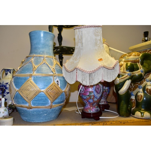 834 - A GROUP OF LAMPS, CERAMICS AND METALWARES, to include a three tier painted metal plant stand height ... 