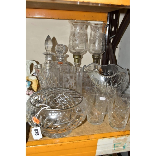 838 - A GROUP OF CUT CRYSTAL AND OTHER GLASSWARES, to include a pair of tall candle holders etched with vi... 