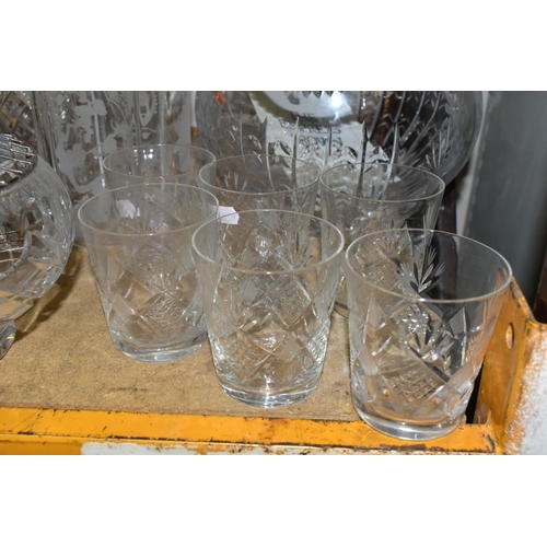 838 - A GROUP OF CUT CRYSTAL AND OTHER GLASSWARES, to include a pair of tall candle holders etched with vi... 