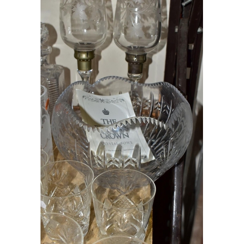 838 - A GROUP OF CUT CRYSTAL AND OTHER GLASSWARES, to include a pair of tall candle holders etched with vi... 