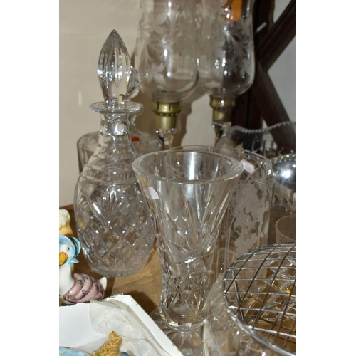 838 - A GROUP OF CUT CRYSTAL AND OTHER GLASSWARES, to include a pair of tall candle holders etched with vi... 