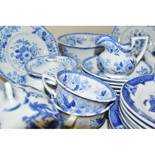 845 - A GROUP OF TOY TEA WARES, over thirty five pieces to include a blue and white tea set, possibly by M... 