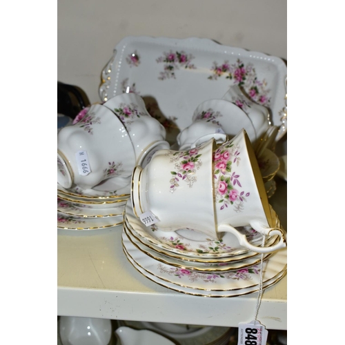 848 - A TWENTY PIECE ROYAL ALBERT LAVENDER ROSE TEA SET, comprising a sandwich plate, six tea cups, seven ... 