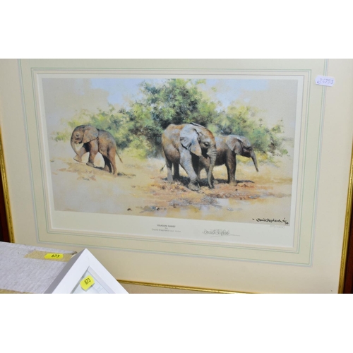 873 - A GROUP OF DAVID SHEPHERD PRINTS AND PLATES, comprising a framed 'Kilaguni Babies' baby elephants, n... 