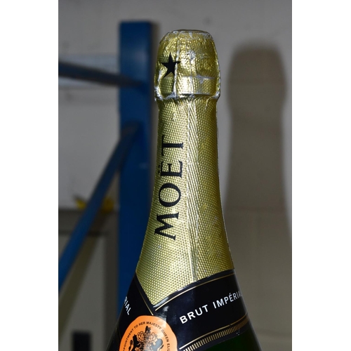 876 - A MOET & CHANDON DISPLAY BOTTLE AND A PAINTING ON WOOD, comprising a Moet & Chandon display bottle w... 