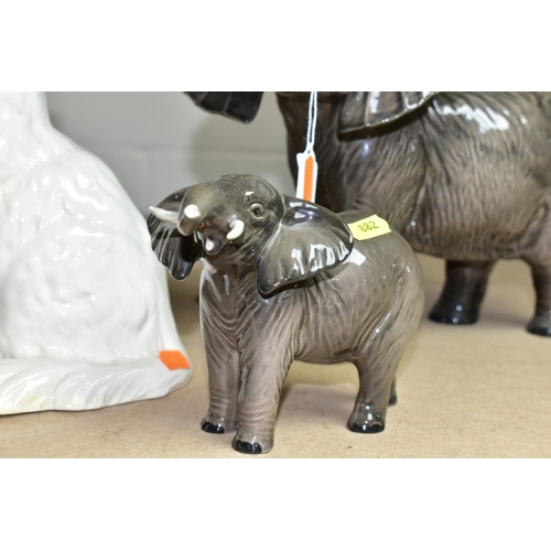 882 - FIVE BESWICK ANIMALS, comprising Elephant -Trunk stretching - small, model no.974, Elephant - Trunk ... 