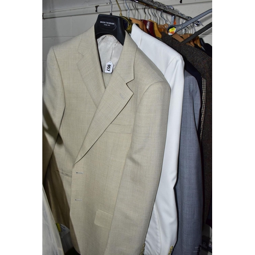 957 - A QUANTITY OF GENTLEMENS CLOTHING, including seven complete two piece suits and eight other jackets ... 