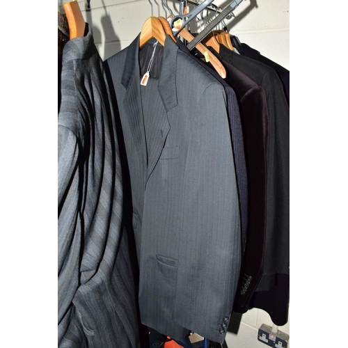 957 - A QUANTITY OF GENTLEMENS CLOTHING, including seven complete two piece suits and eight other jackets ... 