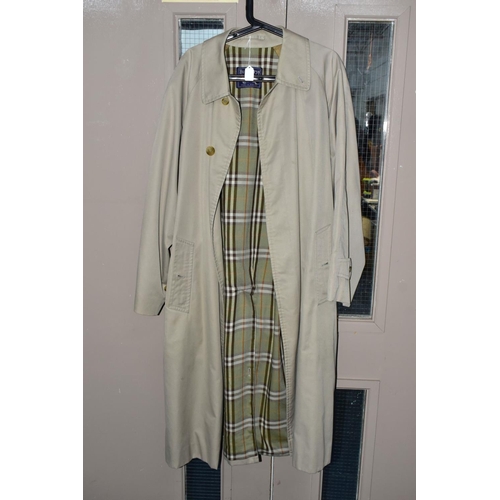 963 - A GENTS BURBURRY KHAKI MAC AND TWO AQUASCUTUM COATS, the Burberry mac with green tartan interior, si... 