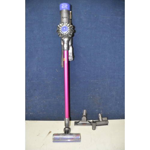 1268 - A DYSON V6 ABSOLUTE Dyson cordless vacuum with charger and accessories (PAT pass and working)