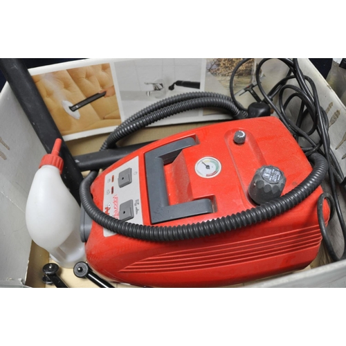 1279 - A VAPORETTO STEAM CLEANER model NoVTT2400 (PAT pass and powers up) with bag of accessories and a Vap... 