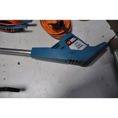 1286 - A BLACK AND DECKER POWER WEEDER model No W100 and a Black and Decker chainsaw with one power cable a... 