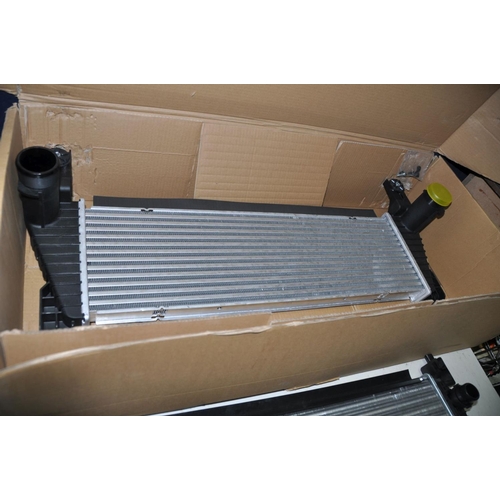 1300 - A SELECTION OF CAR PARTS to include a intercooler and radiator (possibly Mercedes), a radiator (poss... 