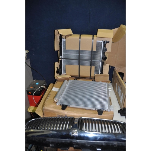 1300 - A SELECTION OF CAR PARTS to include a intercooler and radiator (possibly Mercedes), a radiator (poss... 