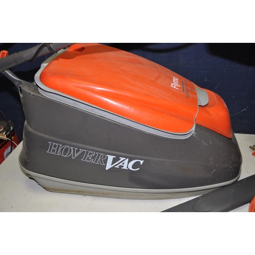 1321 - A FLYMO TURBO COMPACT 350 HOVER VAC model NoTC350 and a FLYMO easy-trim hedge trimmer model No EHT35... 