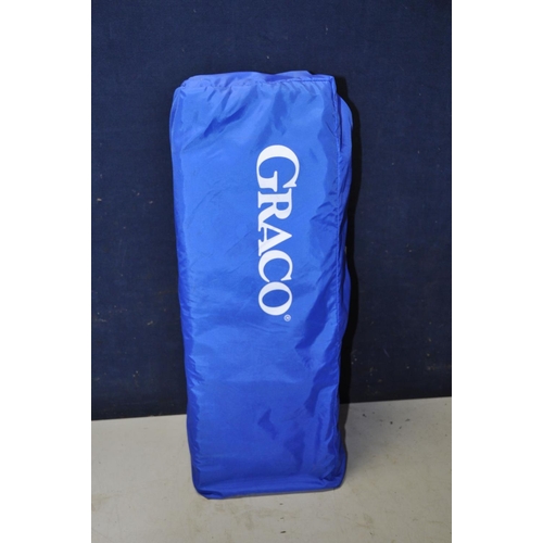 1324 - A GRACO TRAVEL COT