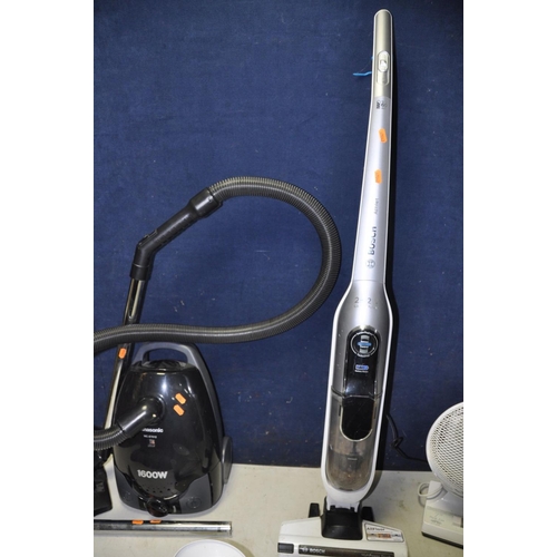 1360 - A BOSCH ATHLET 25.2V VACUUM along with a Panasonic vacuum model No MC-E7012, a seven inch desk fan a... 