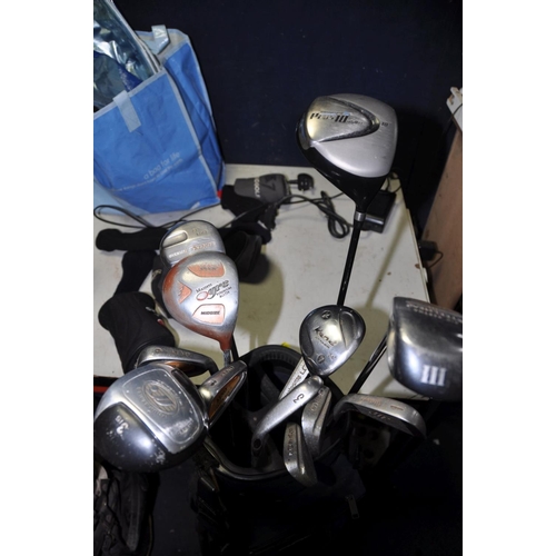 1365 - A SELECTION OF GOLFING EQUIPMENT to include two golf bags containing various clubs, a manual/push al... 