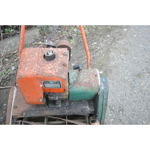 1234 - THREE VINTAGE PETROL LAWN MOWERS, to include a Qualcast Suffolk Punch 43s with grass box (engine pul... 