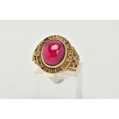 109 - A YELLOW METAL AND GARNET RING, an oval cabochon garnet, set in a yellow metal, signed '3 PARA' 'WHO... 