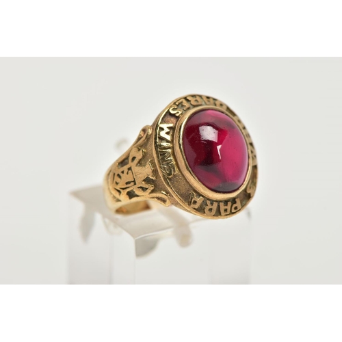109 - A YELLOW METAL AND GARNET RING, an oval cabochon garnet, set in a yellow metal, signed '3 PARA' 'WHO... 