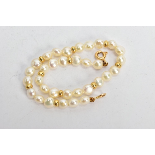 112 - A CULTURED PEARL BRACELET, cultured white button pearls every three pearls interspaced with a yellow... 