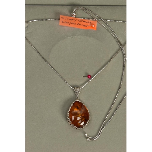 113 - A SILVER GEMSET NECKLACE A WHITE METAL GEMSET NECKLACE, BRACELET AND RING, a multi stone necklace co... 