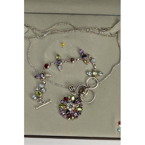 113 - A SILVER GEMSET NECKLACE A WHITE METAL GEMSET NECKLACE, BRACELET AND RING, a multi stone necklace co... 