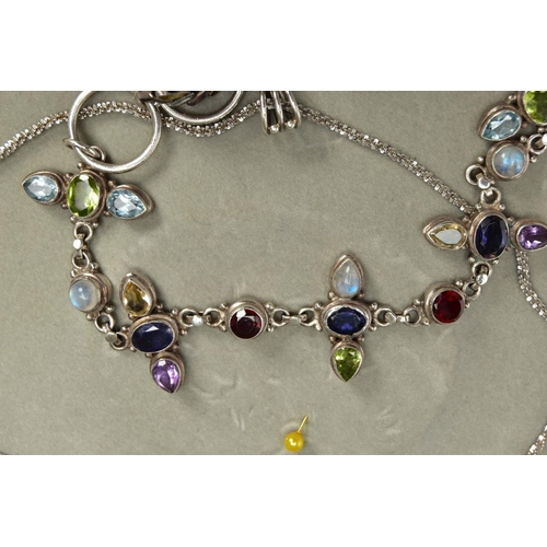 113 - A SILVER GEMSET NECKLACE A WHITE METAL GEMSET NECKLACE, BRACELET AND RING, a multi stone necklace co... 