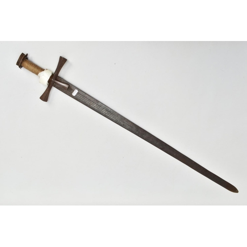 199 - A MEDIEVAL STYLE SWORD, POSSIBLY EUROPEAN IN MANUFACTURE IN THE KASKARAS STYLE, the blade is approxi... 