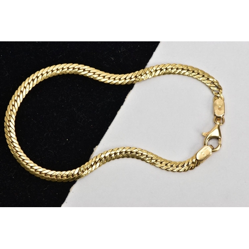 73 - A YELLOW METAL BRACELET, flat herringbone bracelet fitted with a lobster claw clasp, stamped 750, le... 