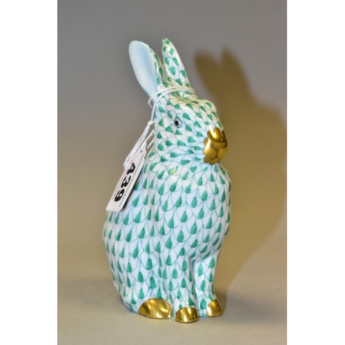 439 - A HEREND GREEN FISHNET FIGURE OF A SEATED RABBIT, model no. 5327, pale blue ears, gilt nose, mouth a... 