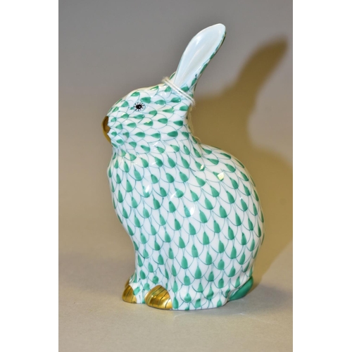439 - A HEREND GREEN FISHNET FIGURE OF A SEATED RABBIT, model no. 5327, pale blue ears, gilt nose, mouth a... 
