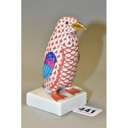441 - A HEREND RED FISHNET FIGURE OF A PENGUIN STANDING ON A SQUARE BASE, model no. 5176, gilt beak, multi... 