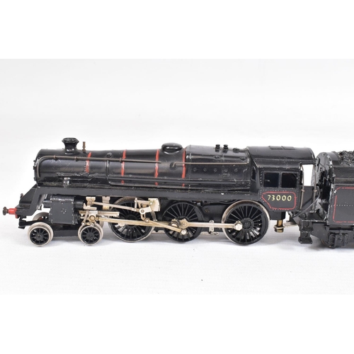 60 - TWO BOXED TRIX HO GAUGE STANDARD CLASS 5 LOCOMOTIVES, No.73000, B.R. lined black livery, with a simi... 