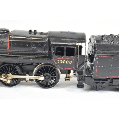 60 - TWO BOXED TRIX HO GAUGE STANDARD CLASS 5 LOCOMOTIVES, No.73000, B.R. lined black livery, with a simi... 