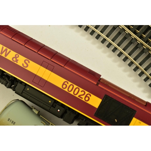 195 - AN UNBOXED HORNBY OO GAUGE CLASS 60 LOCOMOTIVE, No.60 026, E.W.S. maroon livery (R2488), appears lar... 