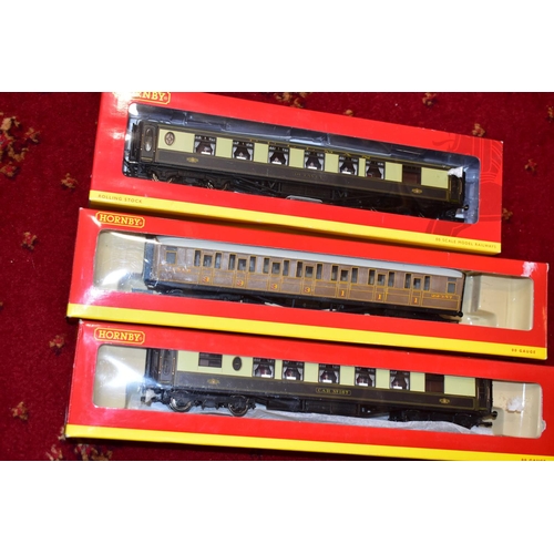 206 - A QUANTITY OF BOXED HORNBY RAILWAYS OO GAUGE ROLLING STOCK AND LINESIDE ACCESSORIES,  to include Rai... 