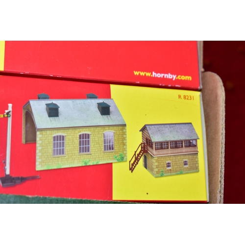 206 - A QUANTITY OF BOXED HORNBY RAILWAYS OO GAUGE ROLLING STOCK AND LINESIDE ACCESSORIES,  to include Rai... 