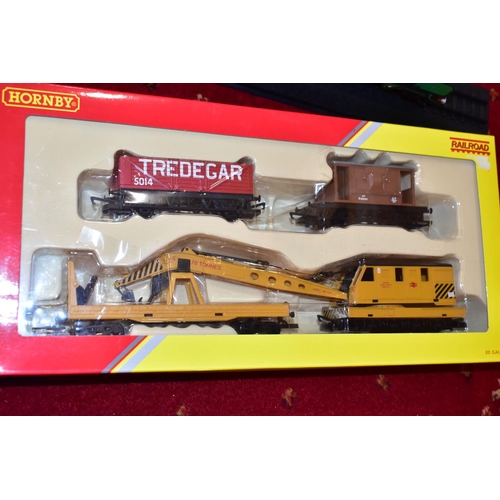 206 - A QUANTITY OF BOXED HORNBY RAILWAYS OO GAUGE ROLLING STOCK AND LINESIDE ACCESSORIES,  to include Rai... 