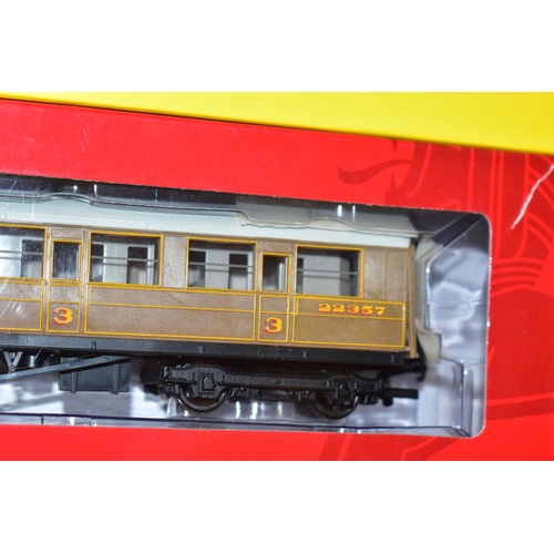 206 - A QUANTITY OF BOXED HORNBY RAILWAYS OO GAUGE ROLLING STOCK AND LINESIDE ACCESSORIES,  to include Rai... 