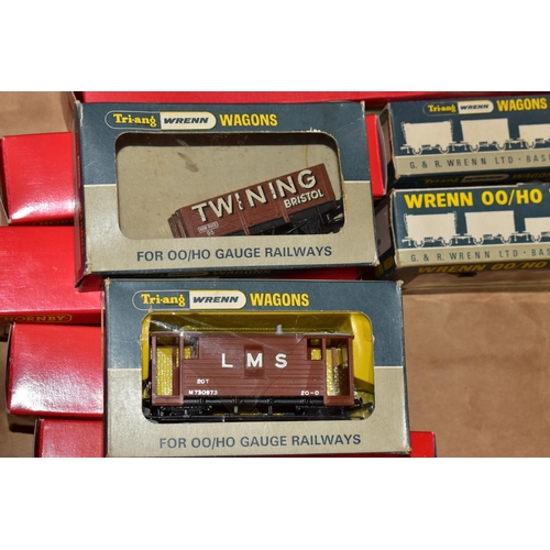 214 - A QUANTITY OF MAINLY BOXED OO GAUGE MODEL RAILWAY ROLLING STOCK, to include boxed Tri-ang Wrenn and ... 