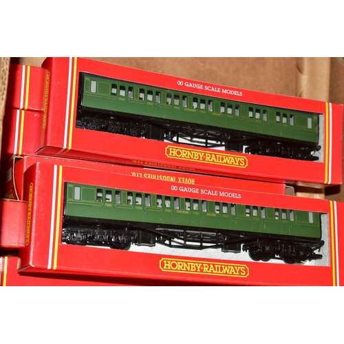 214 - A QUANTITY OF MAINLY BOXED OO GAUGE MODEL RAILWAY ROLLING STOCK, to include boxed Tri-ang Wrenn and ... 